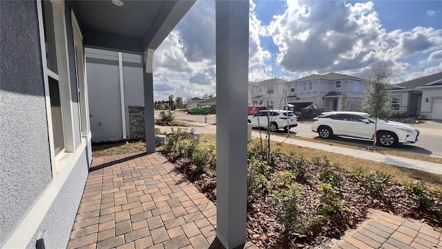 view of patio with a residential view