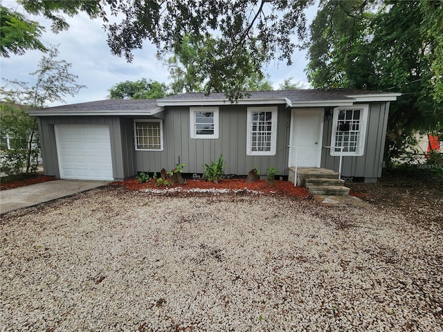 ranch-style home with a garage