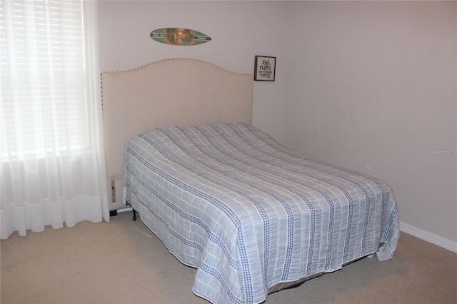 bedroom featuring carpet flooring