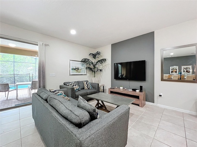 living room with light tile patterned flooring