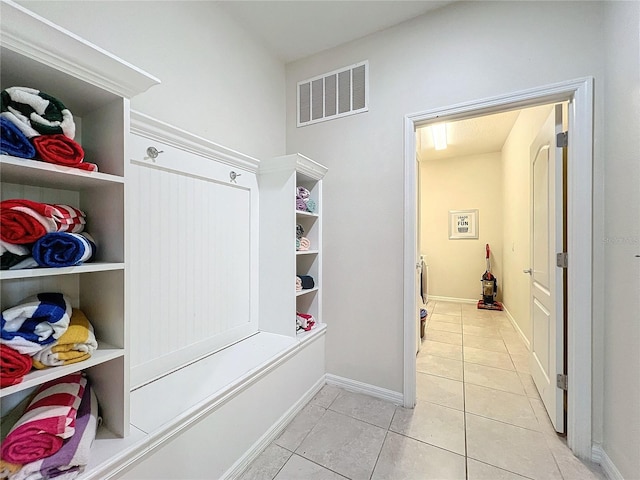 mudroom featuring light tile patterned flooring