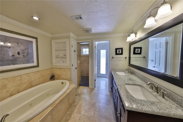 bathroom featuring a textured ceiling, vanity, shower with separate bathtub, and crown molding