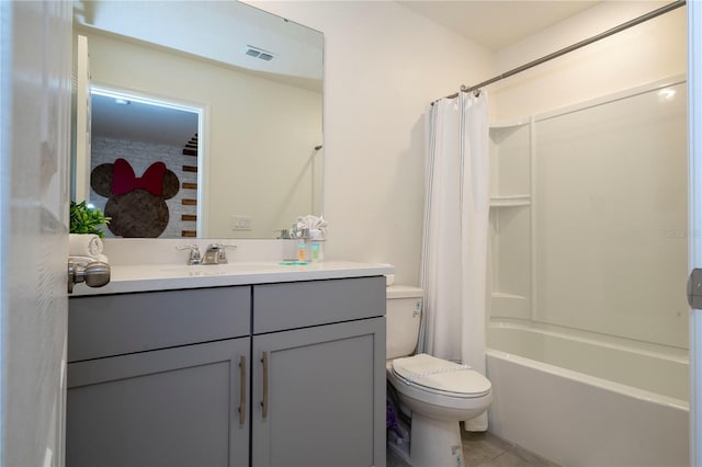 full bathroom featuring tile patterned floors, shower / bathtub combination with curtain, toilet, and vanity