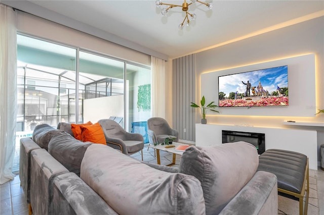 tiled living room with an inviting chandelier and a wealth of natural light