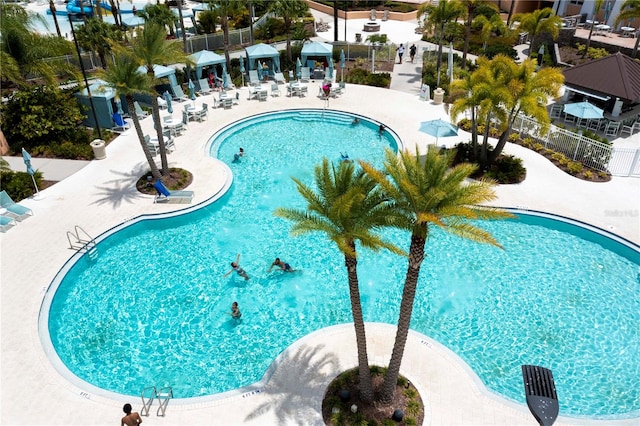 view of swimming pool featuring a patio area