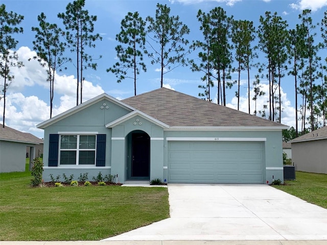 ranch-style home with cooling unit, a front yard, and a garage