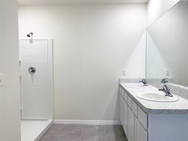 bathroom with vanity and tile patterned floors