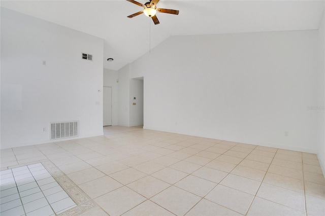 tiled spare room featuring high vaulted ceiling and ceiling fan