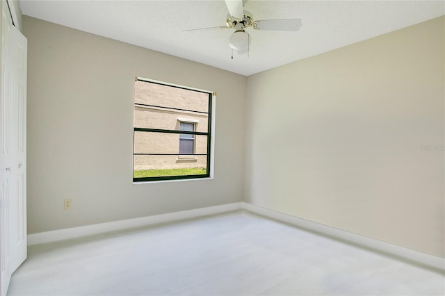 unfurnished room featuring ceiling fan