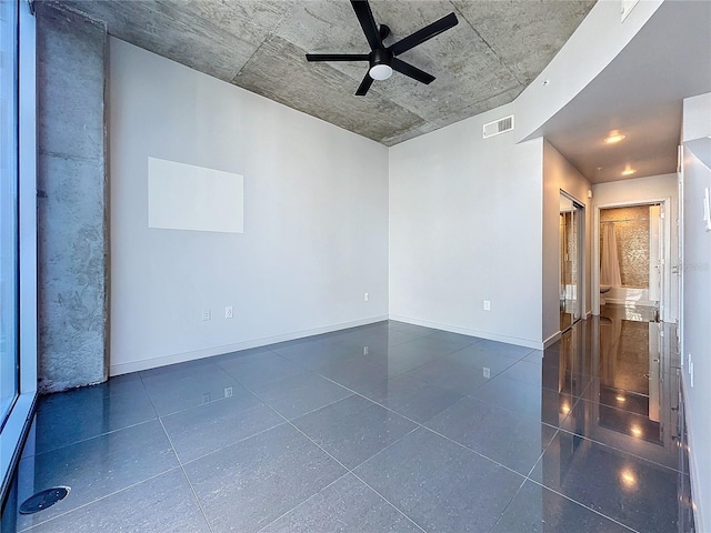 unfurnished room featuring ceiling fan