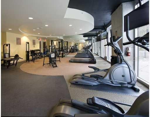 155 S Court Ave Unit 1610, Orlando, FL 32801 - gym with recessed lighting and plenty of natural light