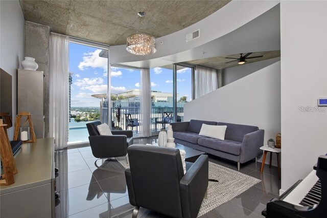 155 S Court Ave Unit 1610, Orlando, FL 32801 - tiled living room featuring floor to ceiling windows and ceiling fan