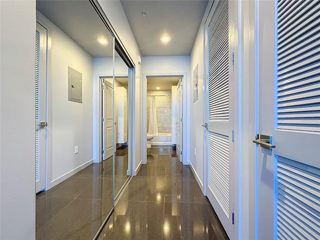 155 S Court Ave Unit 1610, Orlando, FL 32801 - hallway featuring electric panel and baseboards