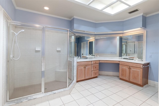 bathroom featuring tile patterned flooring, vanity, ornamental molding, and an enclosed shower