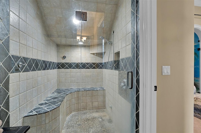 full bathroom with a shower stall