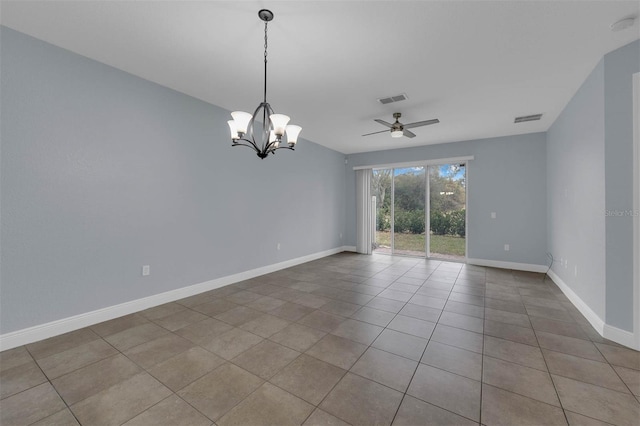 unfurnished room with light tile patterned flooring and ceiling fan with notable chandelier