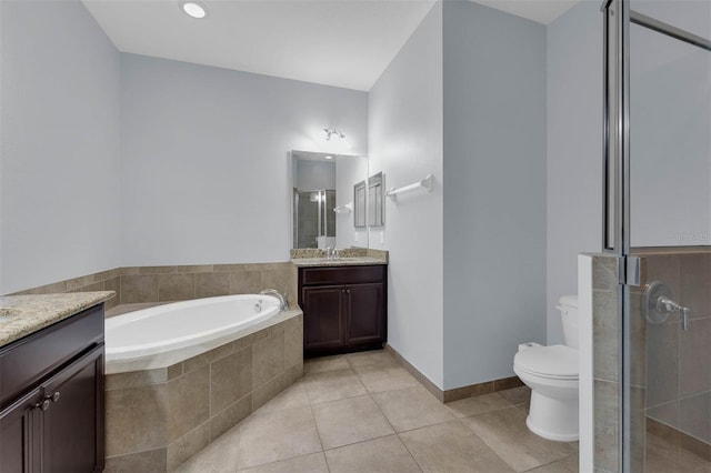 full bathroom featuring tile patterned floors, vanity, toilet, and plus walk in shower