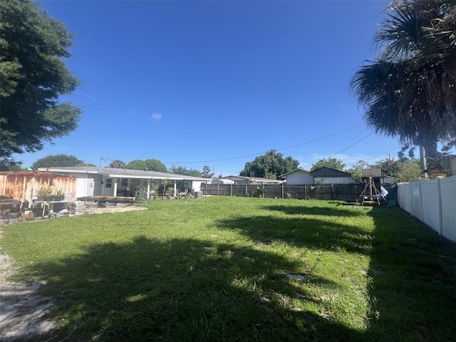 view of yard featuring a playground