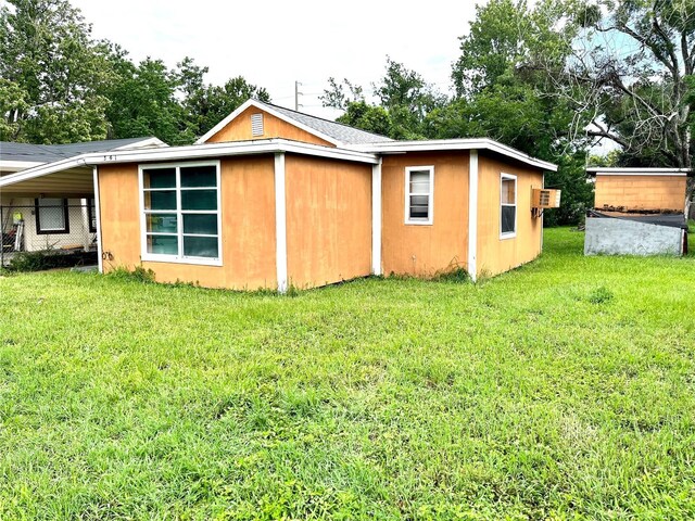 view of property exterior featuring a yard