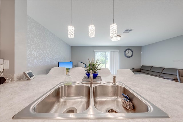 details with pendant lighting and sink