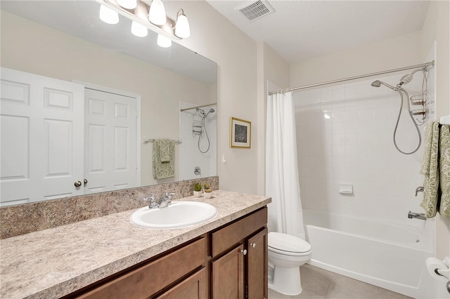 full bathroom featuring tile patterned floors, toilet, vanity, and shower / tub combo with curtain