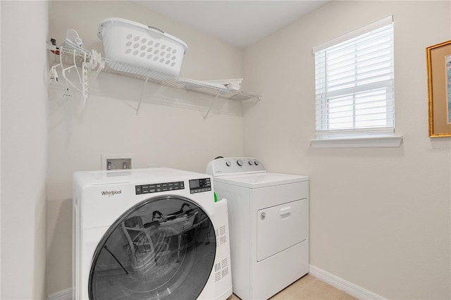 washroom featuring independent washer and dryer