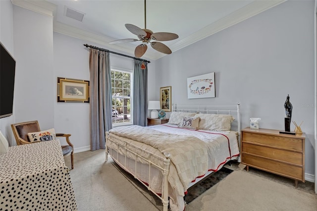 bedroom featuring crown molding, carpet flooring, and ceiling fan