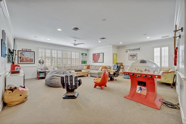 recreation room with crown molding and carpet floors