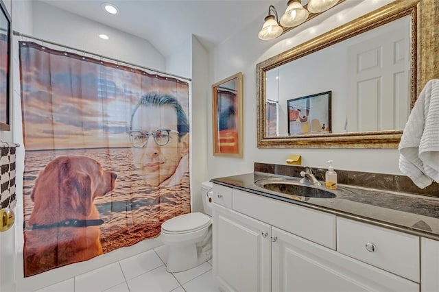 bathroom featuring a shower with shower curtain, vanity, toilet, and tile patterned flooring