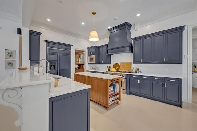 kitchen featuring built in appliances, light stone counters, custom range hood, decorative light fixtures, and kitchen peninsula