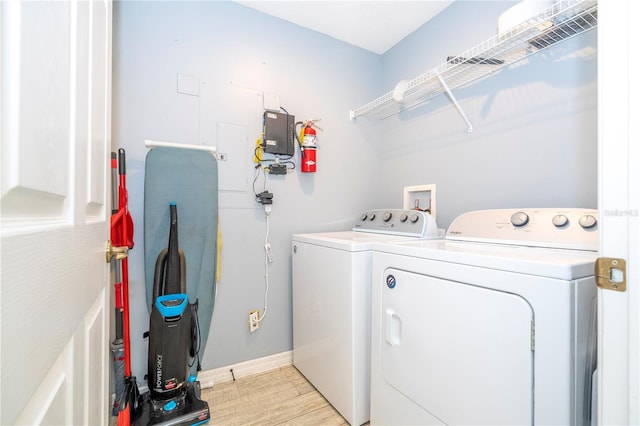 laundry room with washer and dryer