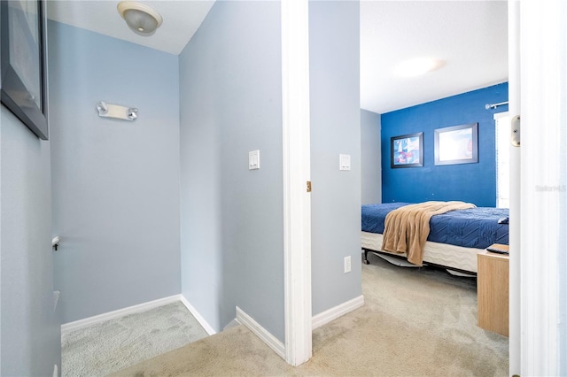 hallway featuring carpet flooring