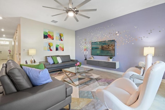 living room with ceiling fan