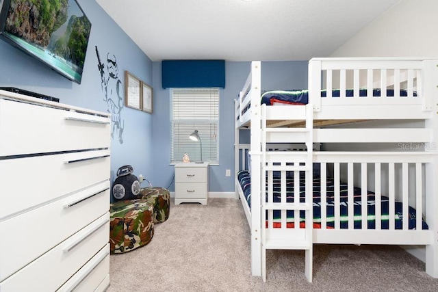 bedroom with light carpet