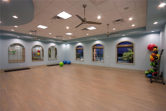 1585 Mulligan Blvd, Davenport, FL 33896 - exercise room with wood finished floors, a drop ceiling, and ceiling fan