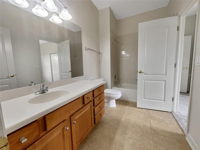 full bathroom with toilet, vanity, tiled shower / bath combo, and tile patterned flooring