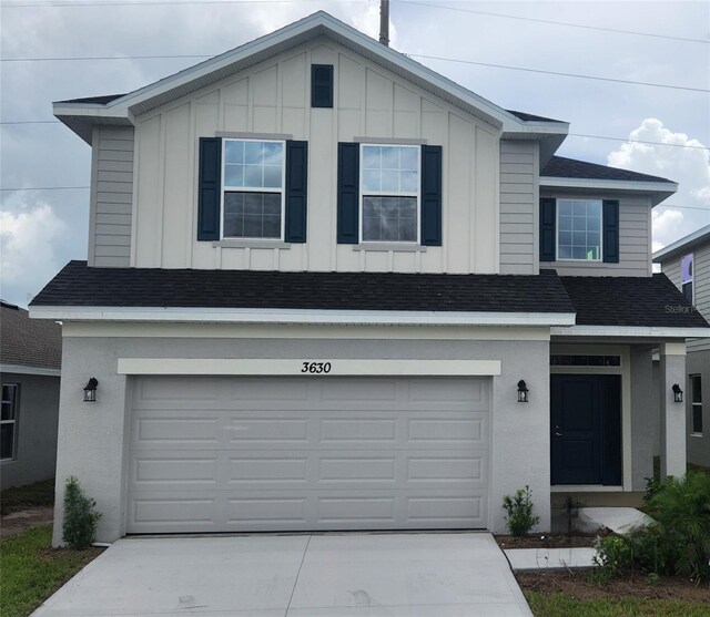 view of front of property featuring a garage