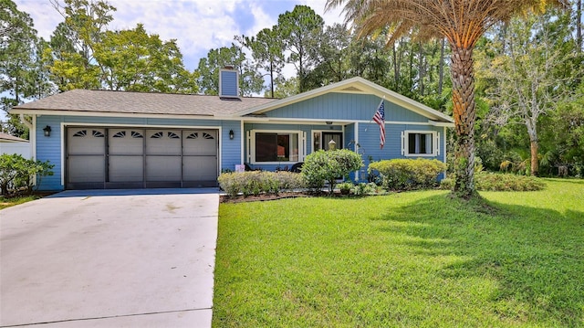 ranch-style home with a garage and a front yard