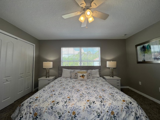 carpeted bedroom featuring ceiling fan, a closet, and a textured ceiling