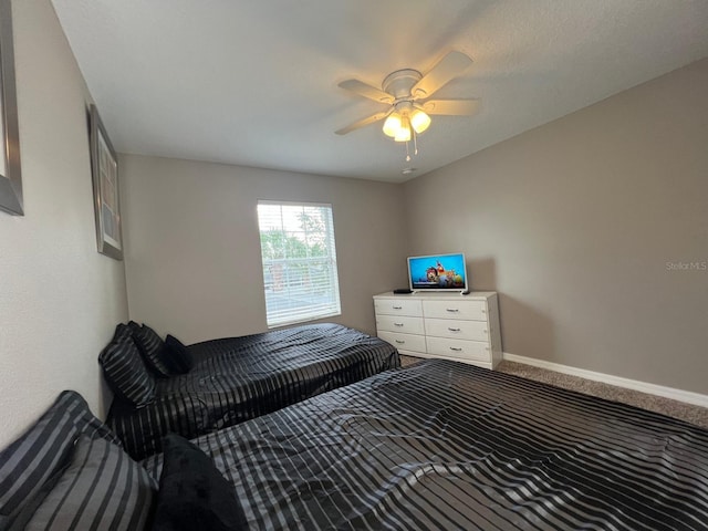 bedroom featuring carpet flooring and ceiling fan