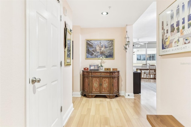 corridor featuring light hardwood / wood-style floors