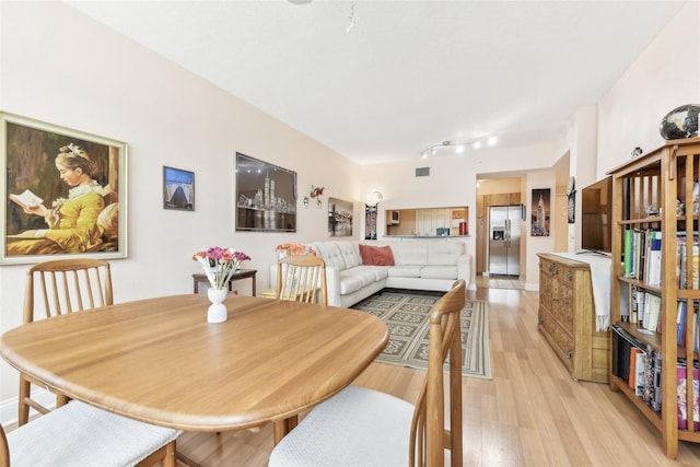 dining area featuring light hardwood / wood-style flooring