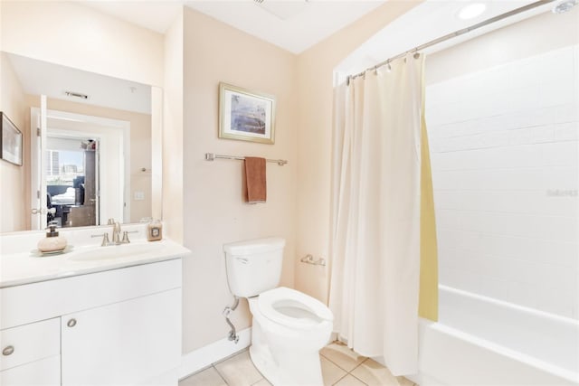 full bathroom with tile patterned flooring, shower / bath combo, vanity, and toilet