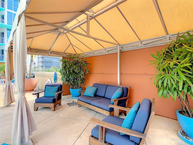 view of patio / terrace featuring an outdoor living space and a gazebo