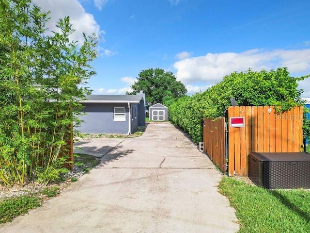 exterior space featuring a shed