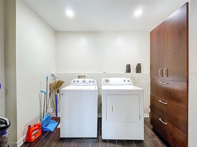 laundry area with cabinets and separate washer and dryer