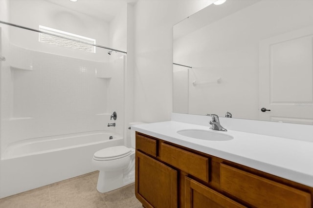 full bathroom with shower / washtub combination, vanity, toilet, and tile patterned floors