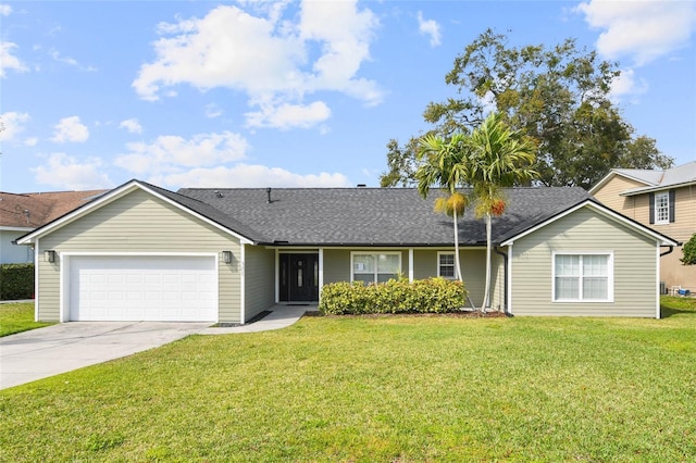 ranch-style home featuring a garage and a front yard