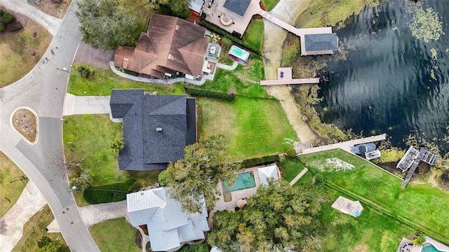 bird's eye view with a water view