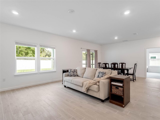 living room featuring light wood-type flooring